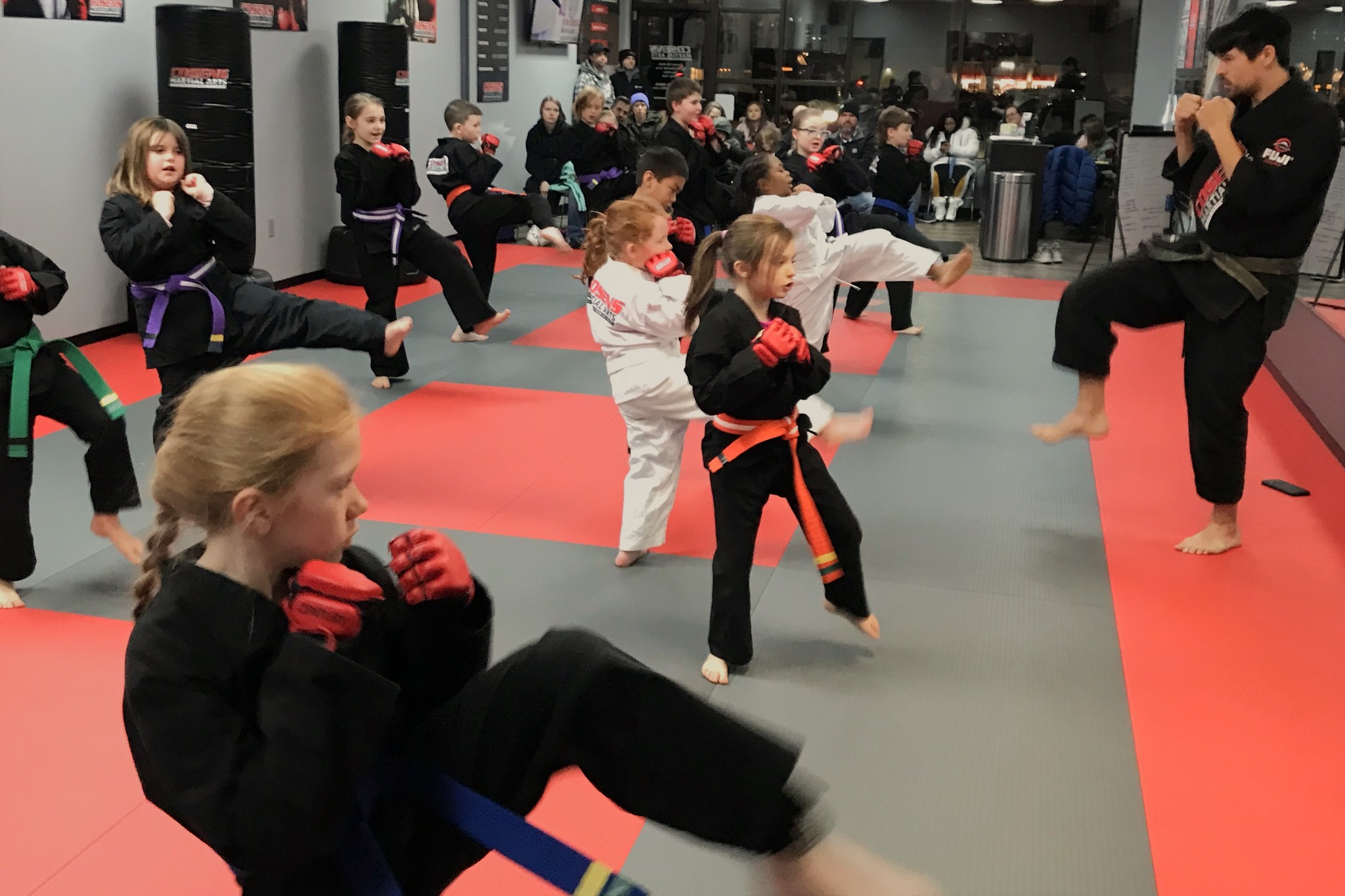 Young boy practicing karate at Cosens Martial Arts in Fenton, MI