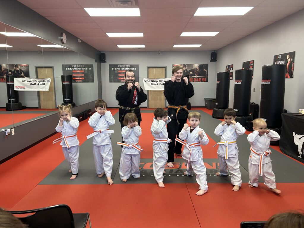 Child learning focus in martial arts class in Fenton